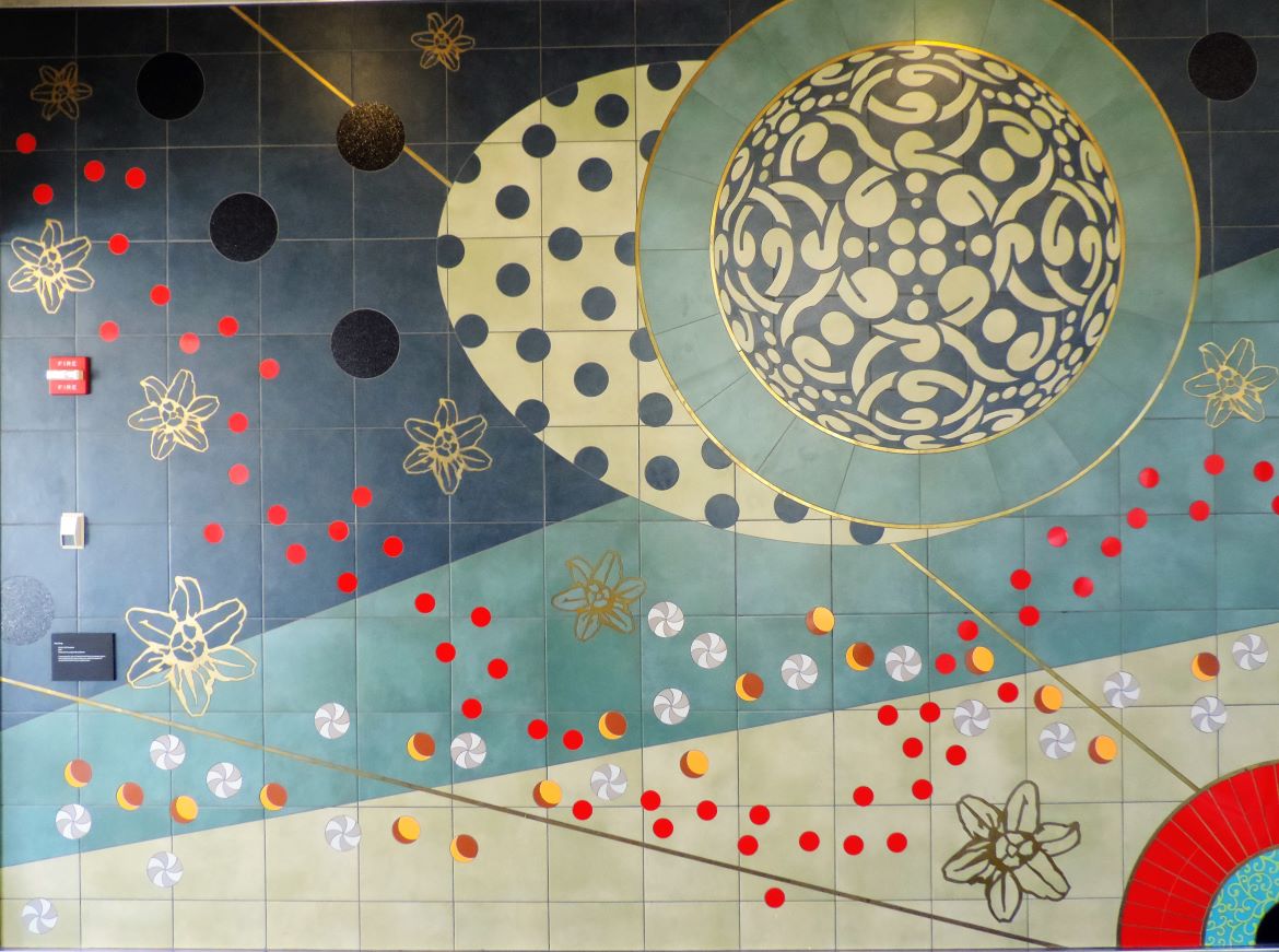 Nucleic Life Formation is a public artwork created by artist Amy Cheng and installed at the St. Louis Lambert International Airport Terminal 1 MetroLink station. Made of ceramic tiles and brass, the piece includes two murals with abstract designs loosely resemblinging the structure of a DNA double helix.