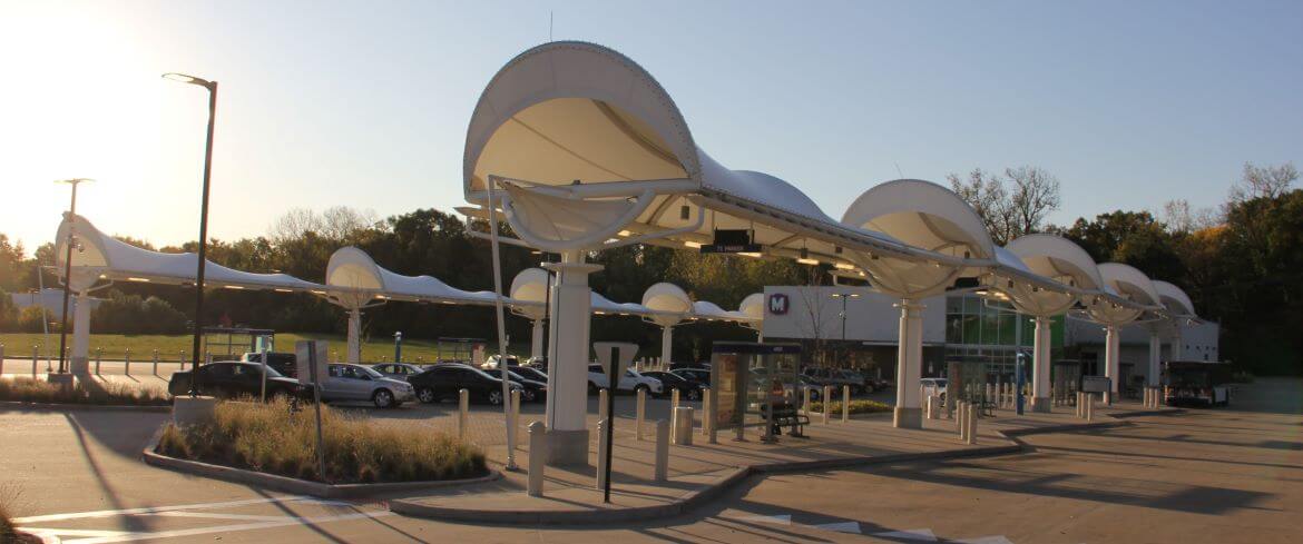 The North County Transit Center Bus Canopies were designed by artist/architect Andrew Leicester. Th canopies resemble the iconic forms of the Conestoga wagon, a symbol of transportation in the 19th century.
