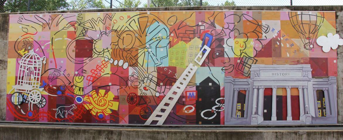 Vehicle.Destination.Imagination is a public art mural by artists Con Christeson and Catharine Magel. The mural is made of painted cement board and dimensional, steel cutouts. The imagery was created through workshops with local community groups and residents.