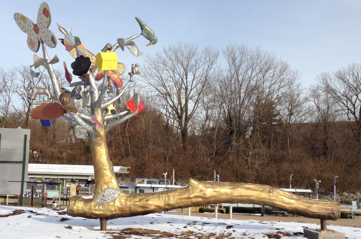 Changing Identities is a public art sculpture by artist Catharine Magel located at the UMSL-South MetroLink Station. The artwork memorializes the lives of four people killed in a bus accident.